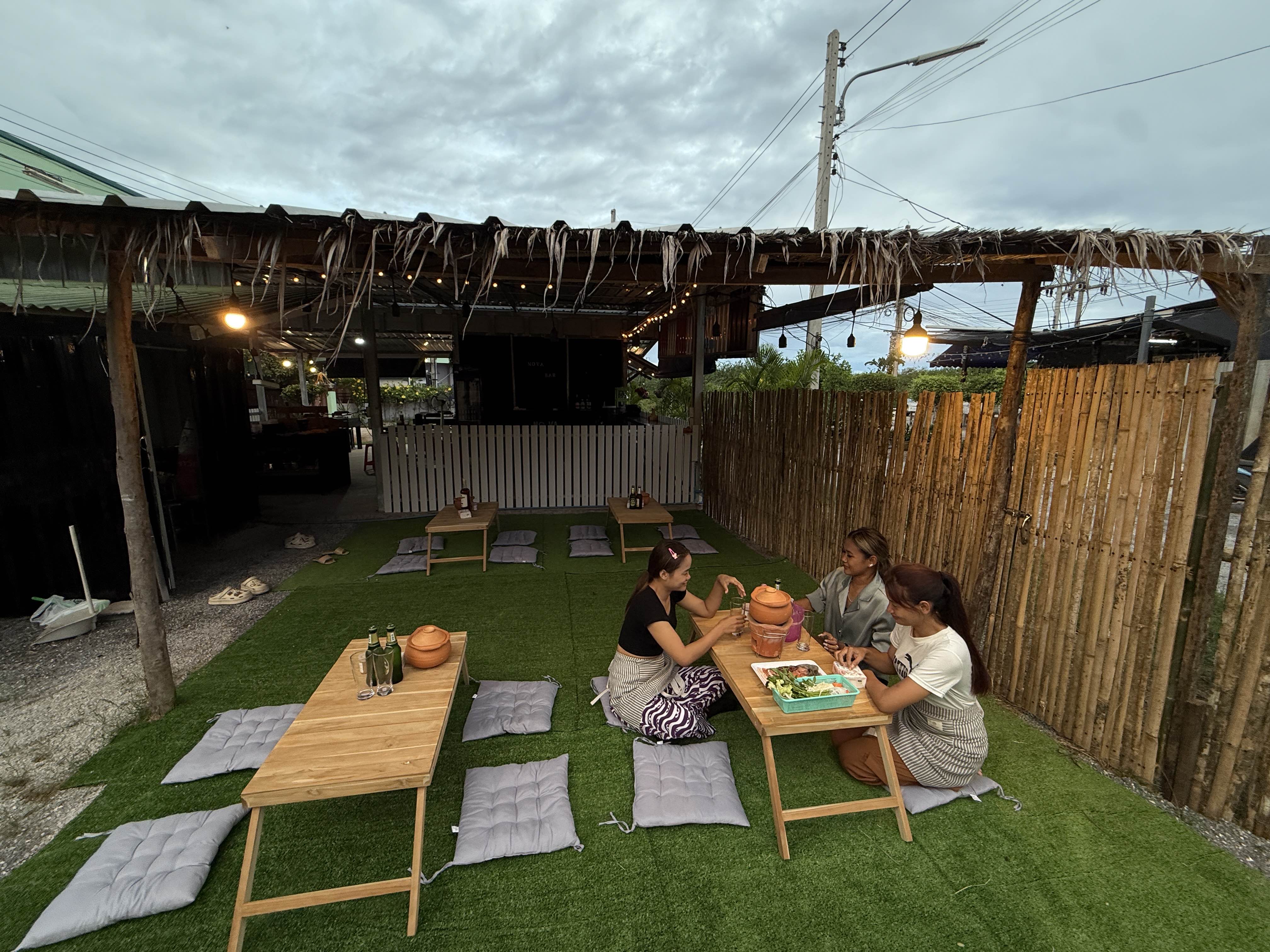 Traditional Thai garden seating with low tables and cushions